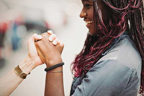 African american teen girl smiling and feeling confident.